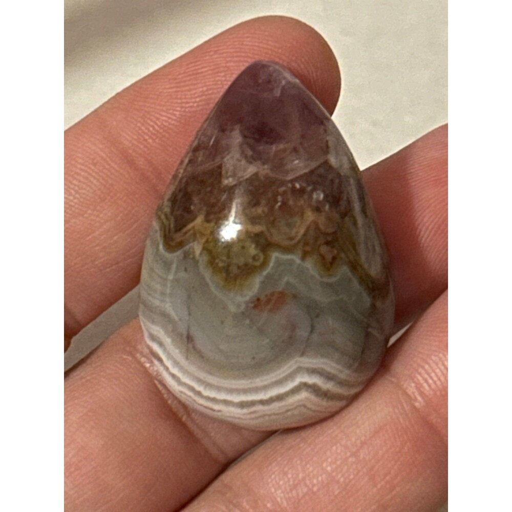 Polished Amethyst and Crazy Lace Agate Cabochon